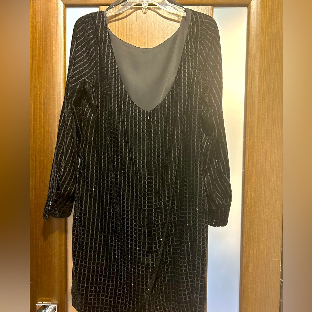 W by worth black dress with long sleeves , hits above the knee.